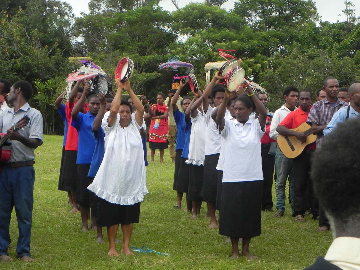 Community worshipping with music.